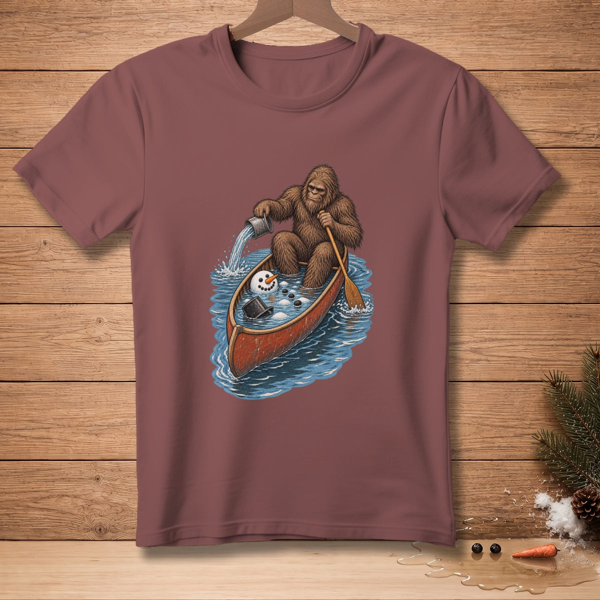 Bigfoot in a canoe pours water on a melting snowman.