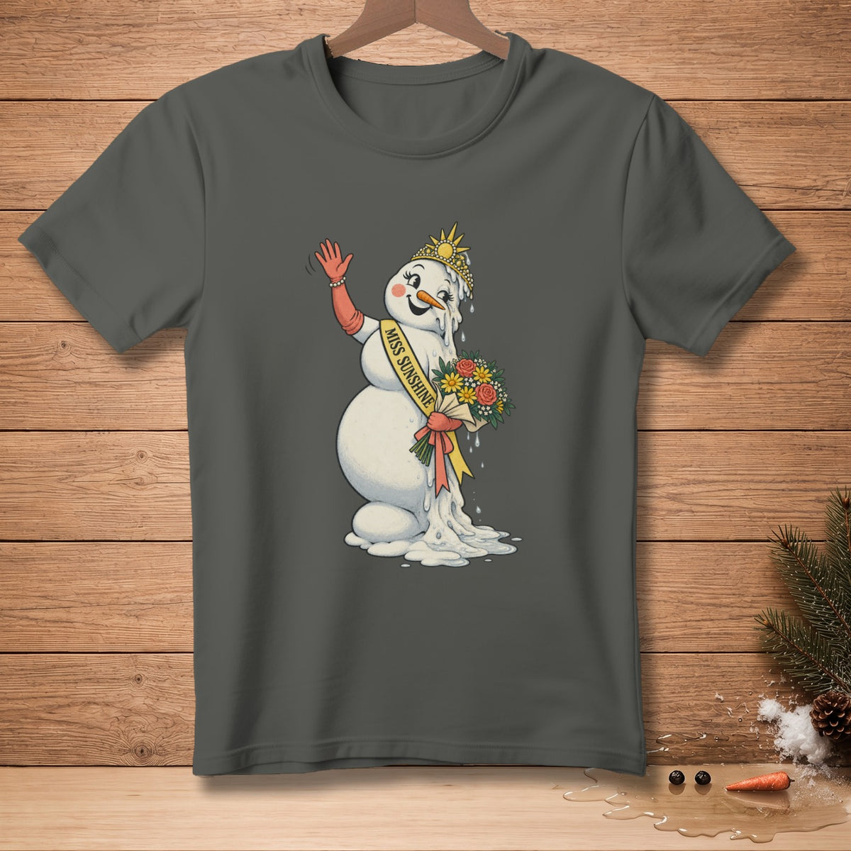 Melting snowman with "Miss Sunshine" sash, crown, flowers, and a red glove.