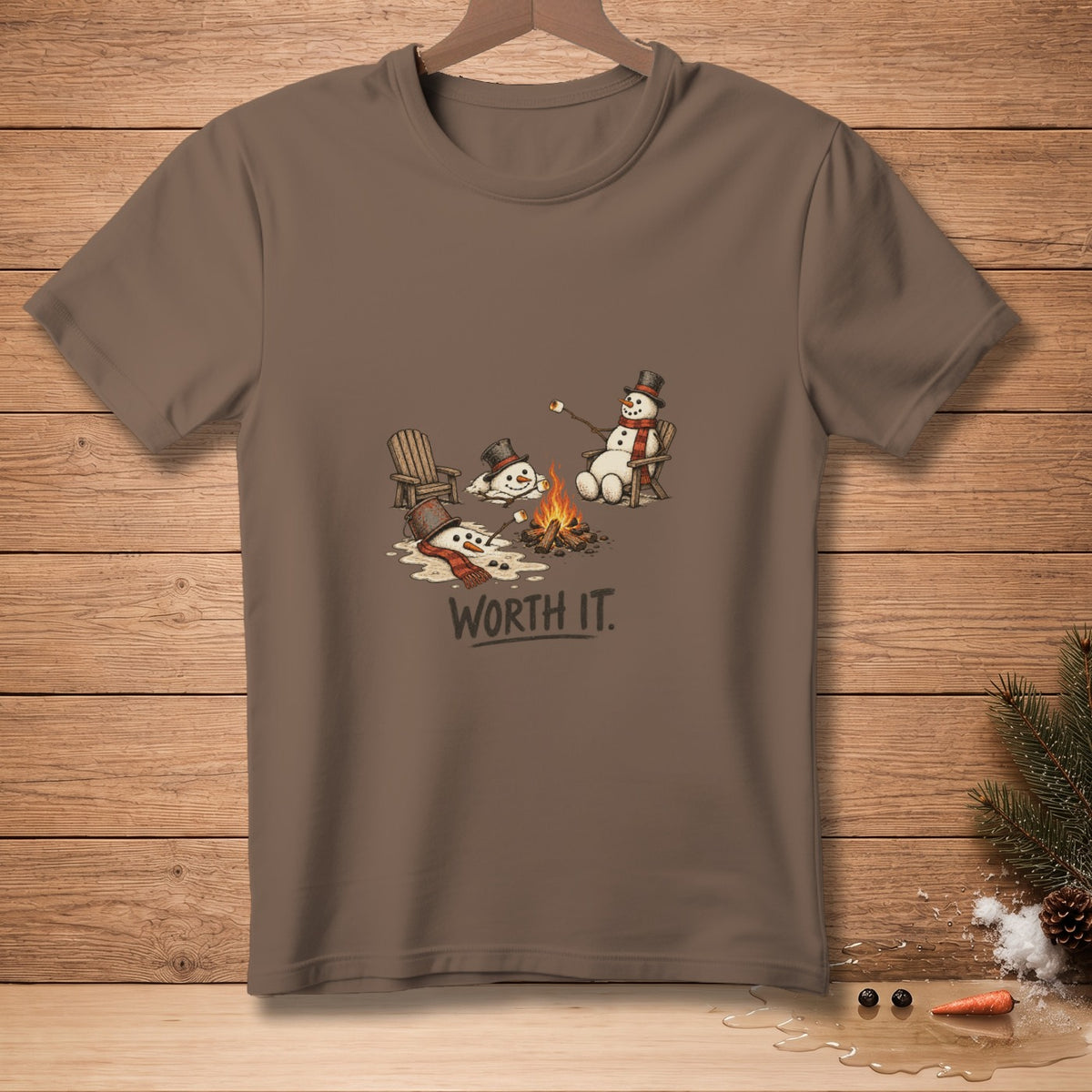 Brown t-shirt with melting snowmen around a campfire, text reads "WORTH IT."