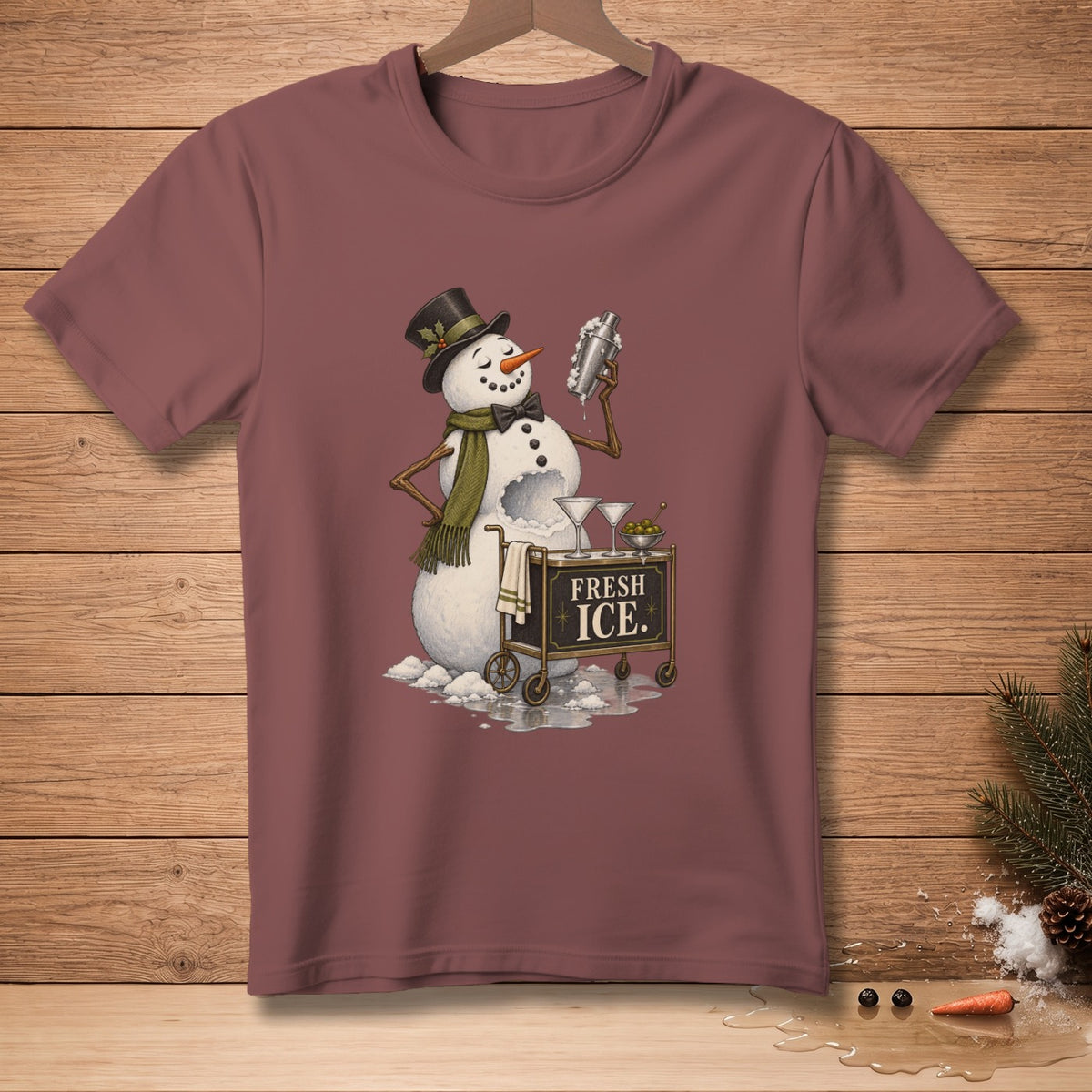 Snowman making a cocktail with a shaker and cart labeled "FRESH ICE."