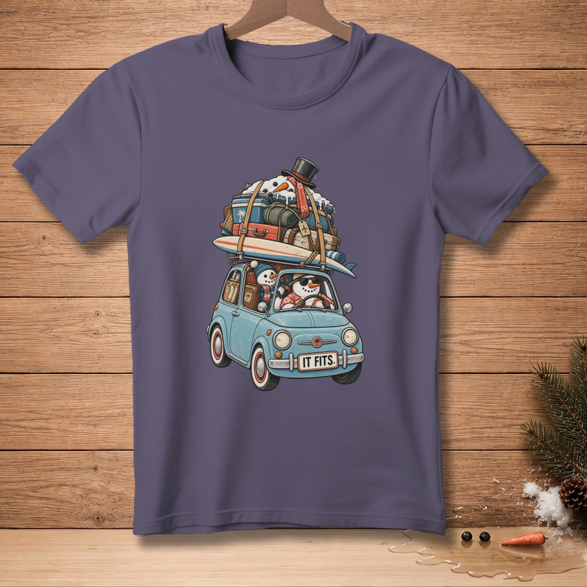 Two snowmen in a tiny blue car overloaded with luggage, "IT FITS."