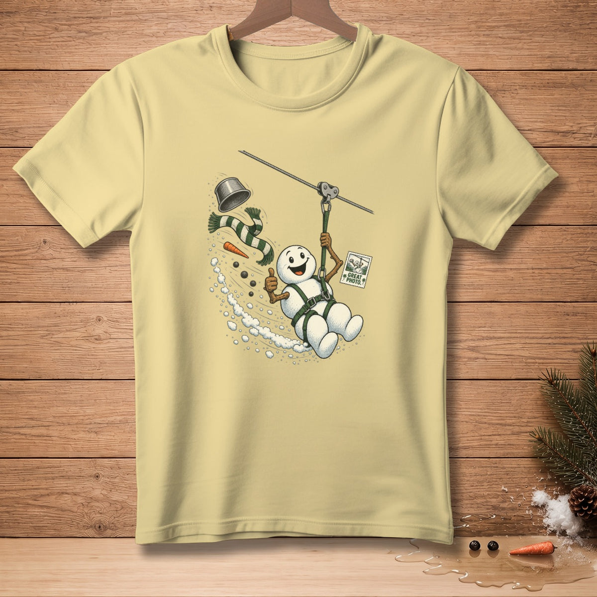 Snowman ziplining with a bucket, scarf, and carrot. "Great Photo" text on sign.