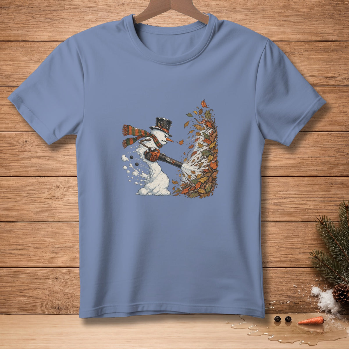 Snowman in a hat and scarf blowing leaves with a leaf blower.