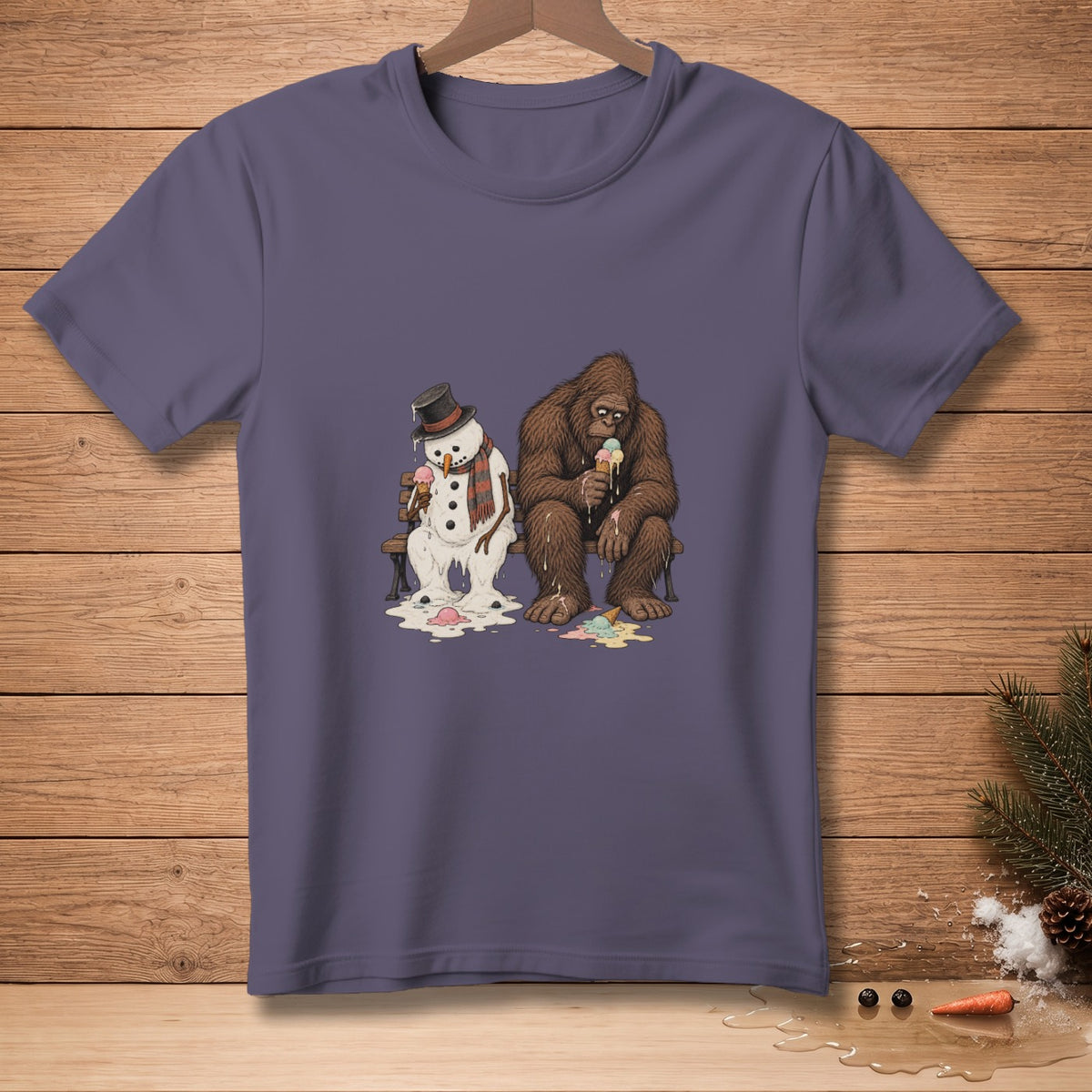 Melting snowman and Bigfoot eating ice cream cones on a bench.
