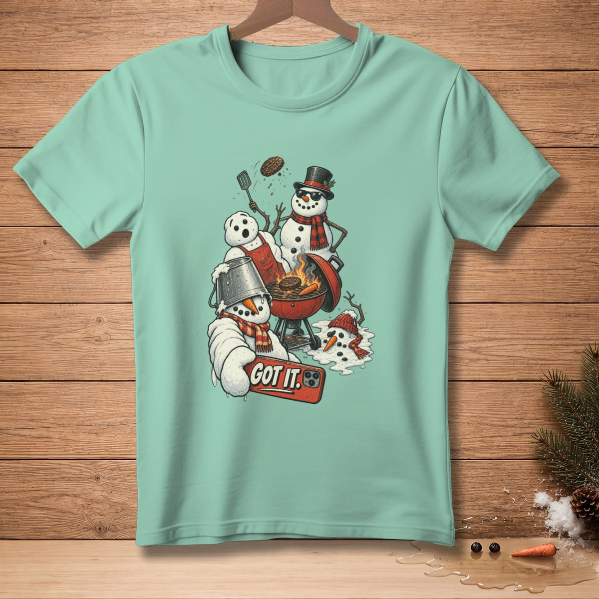 Snowmen grilling with a spatula, selfie stick, and "GOT IT." text.