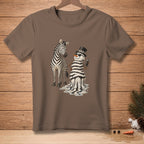 Brown t-shirt with a zebra next to a melting, striped snowman holding a can of spray paint.
