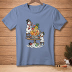 Snowmen enjoying punch with pineapple, oranges, and cherries. "Sharing" text on bowl.