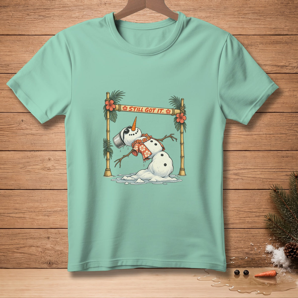 Melting snowman in Hawaiian attire with text "STILL GOT IT."