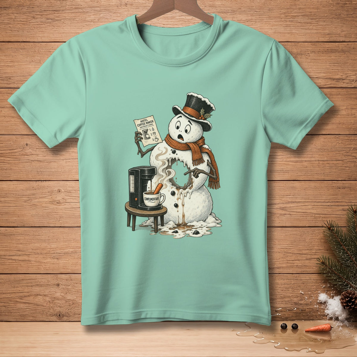 Melting snowman with coffee maker and "Hotel Coffee Maker Instructions" paper.