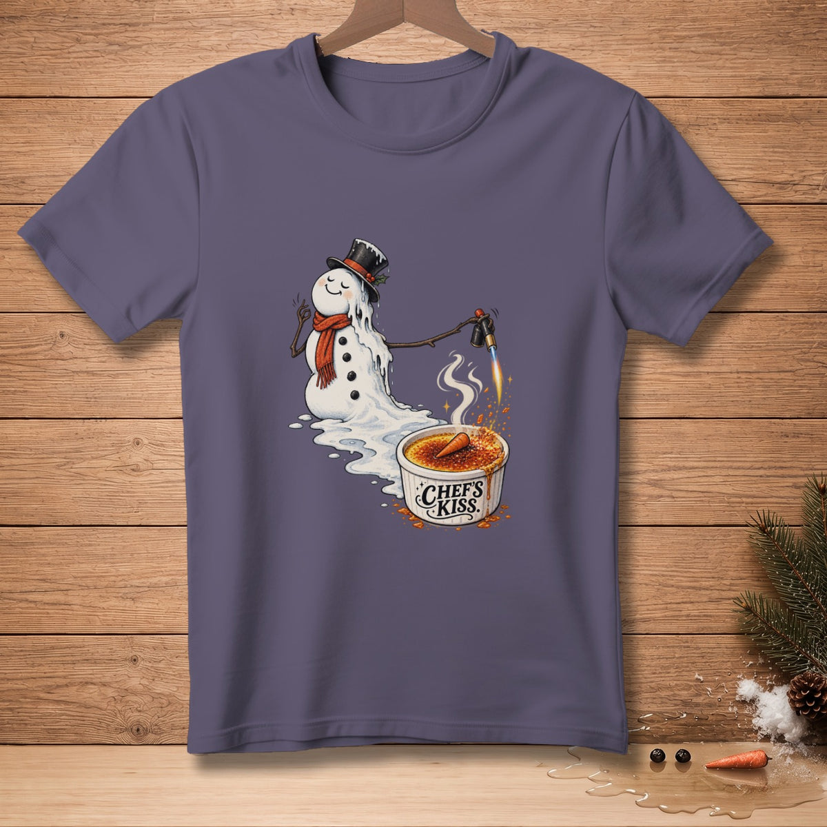 Melting snowman with torch caramelizing crème brûlée with "Chef's Kiss" text.