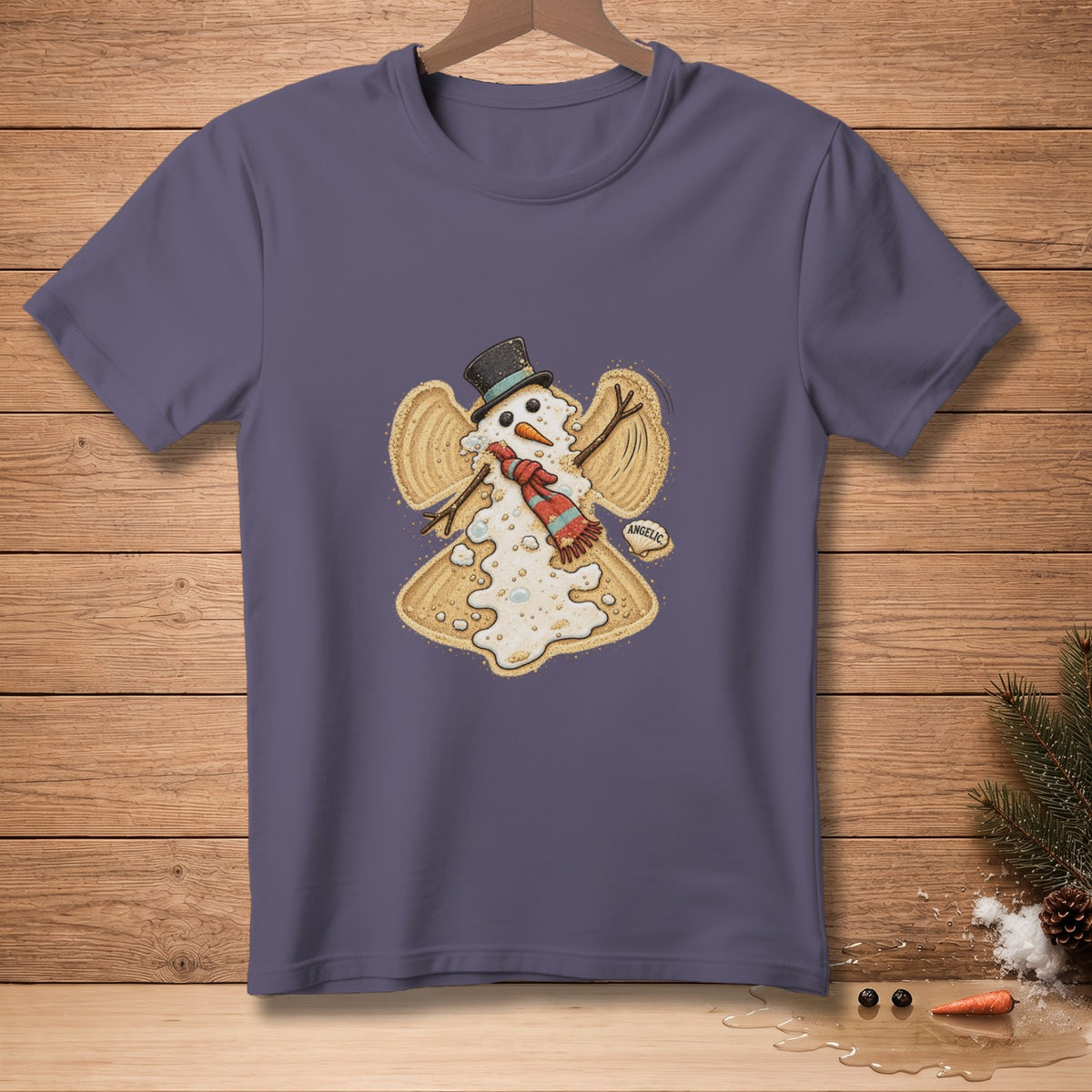 T-shirt featuring a melting snowman angel with a top hat and scarf, saying "Angelic".