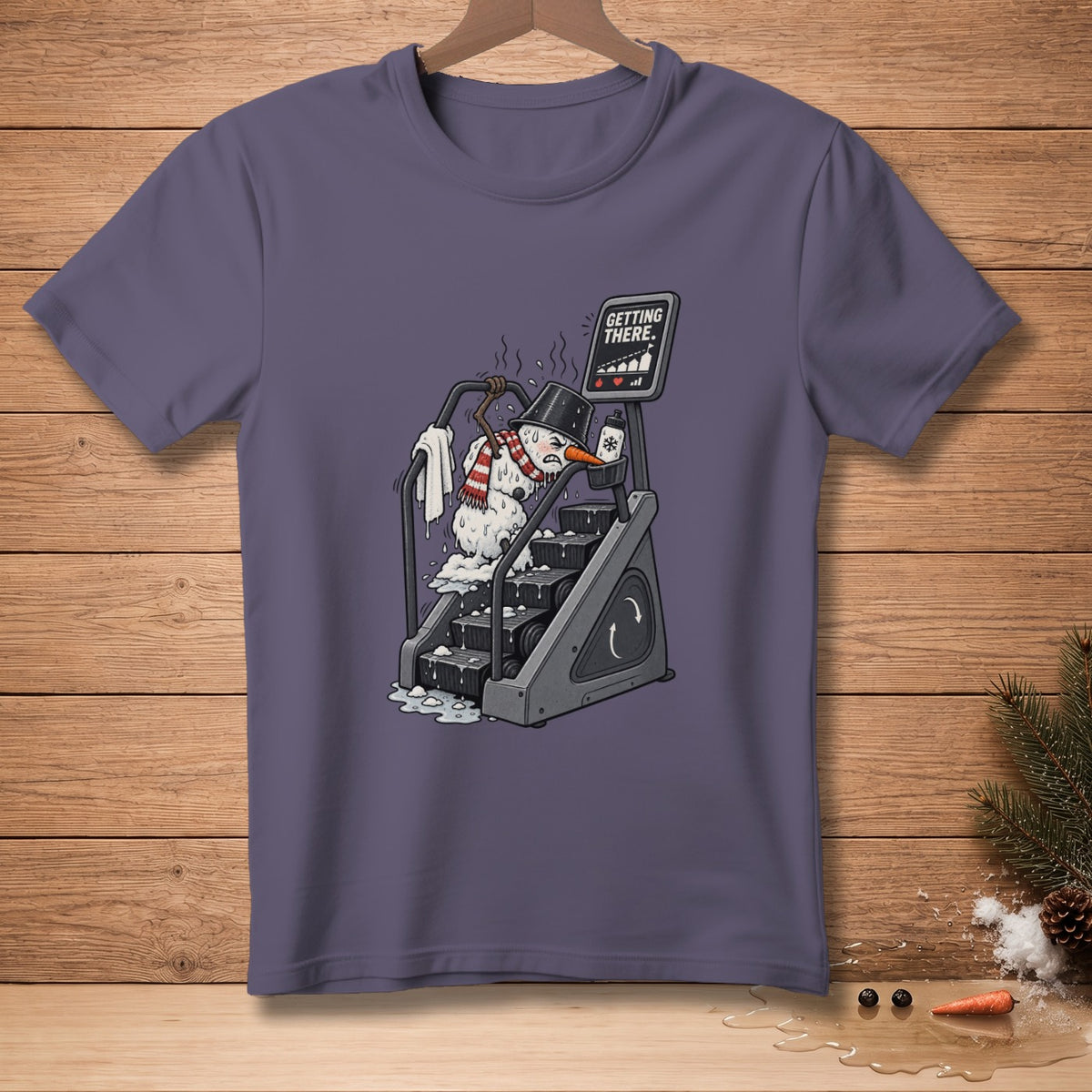 Melting snowman on stair climber with text "GETTING THERE."