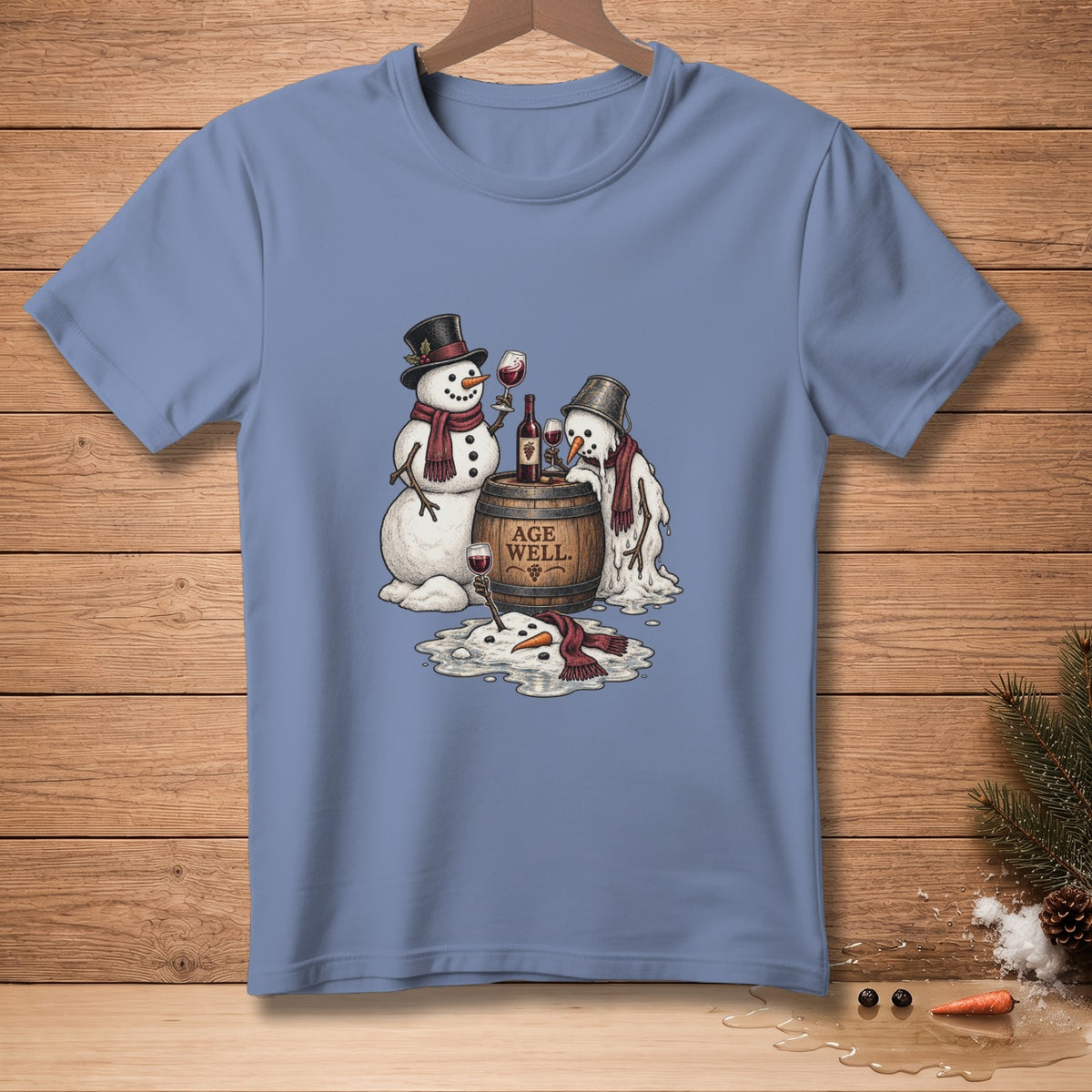 Two melting snowmen with wine on a barrel labeled "Age Well."