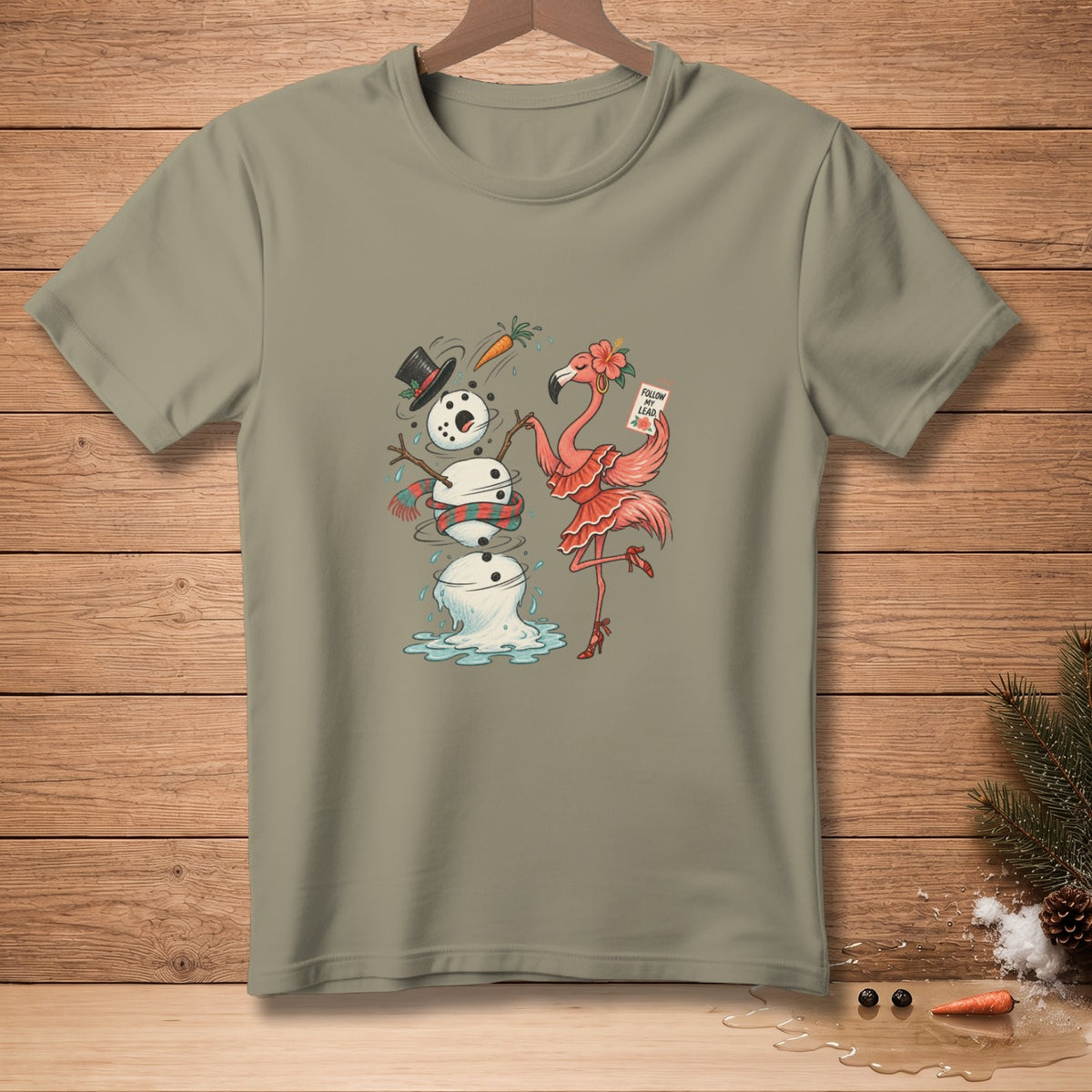 Flamingo dancing next to melting snowman with carrot, holding "Follow My Lead" sign.
