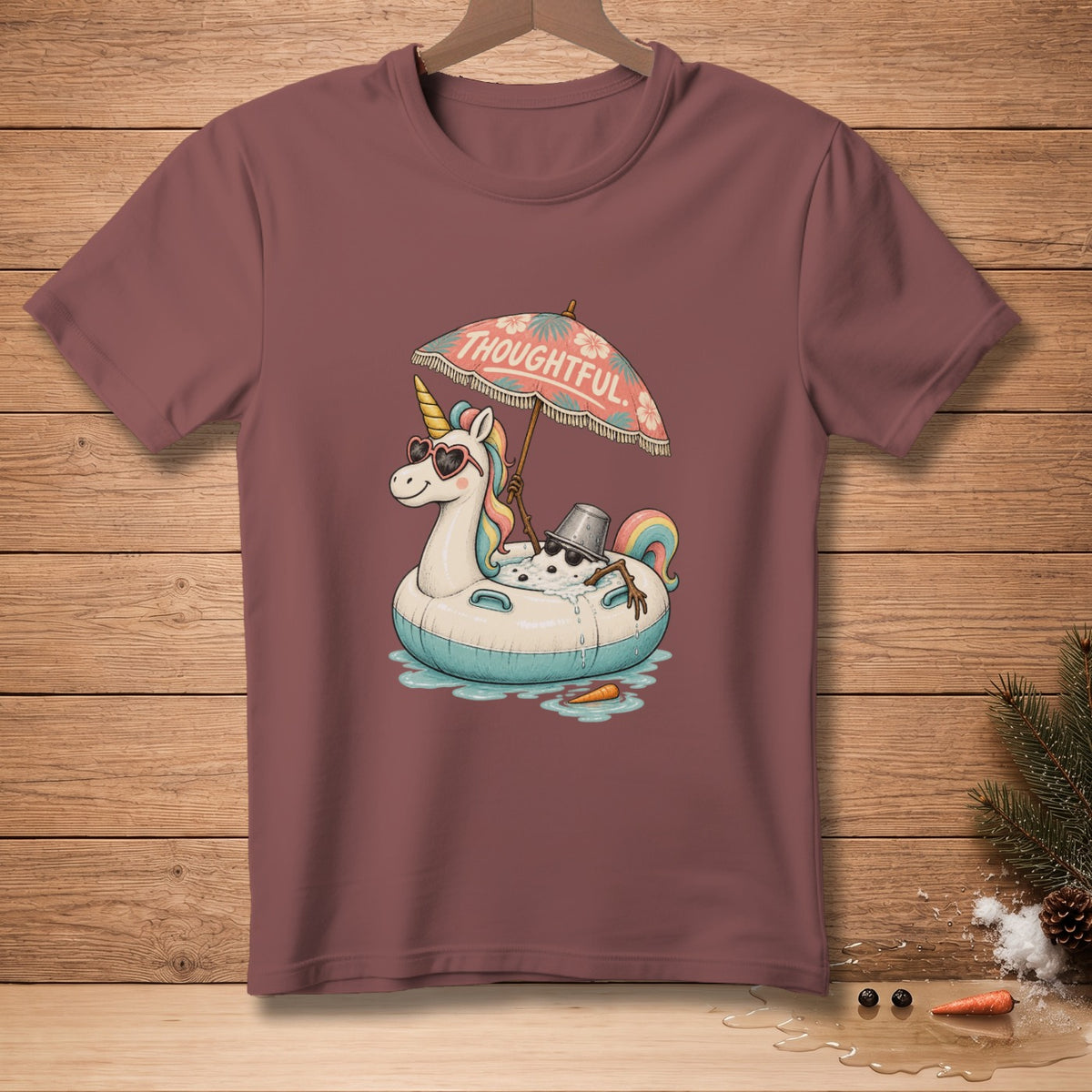 T-shirt with a unicorn on an inflatable, holding a "THOUGHTFUL" umbrella.