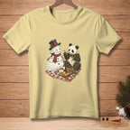 Panda eating bamboo next to melting snowman with wine and cheese picnic.