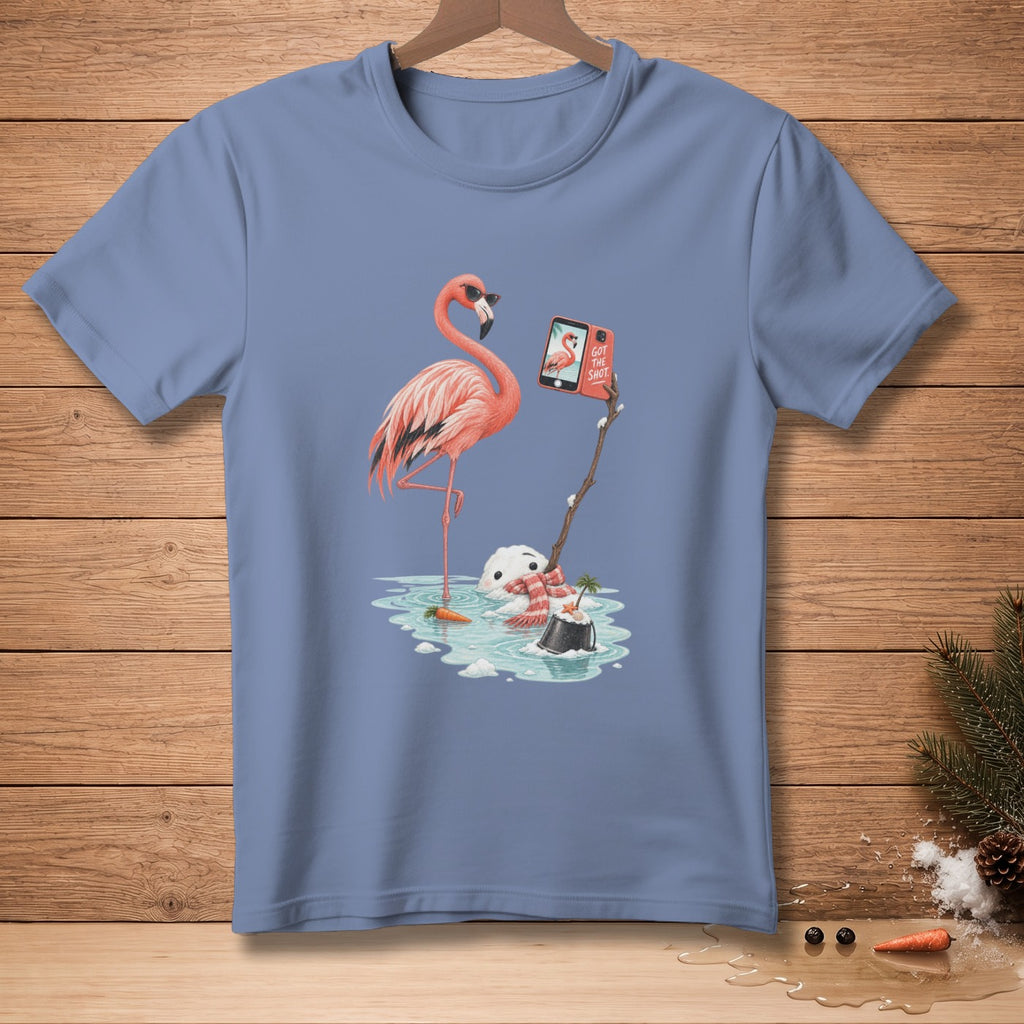 Flamingo wearing sunglasses takes selfie with snowman stuck in melting snow, text "Got the shot".