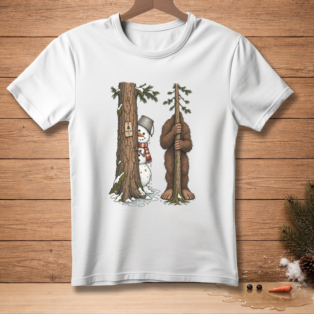 Snowman peeking from behind tree with sign, Bigfoot holding tree, white t-shirt design.
