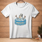 White t-shirt graphic with snowman melting in an inflatable pool filled with ice bags.