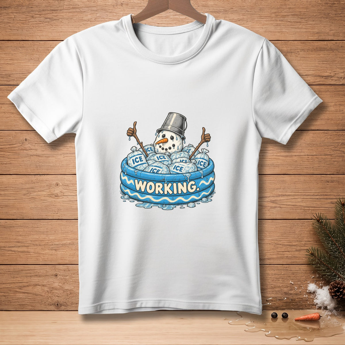 White t-shirt graphic with snowman melting in an inflatable pool filled with ice bags.