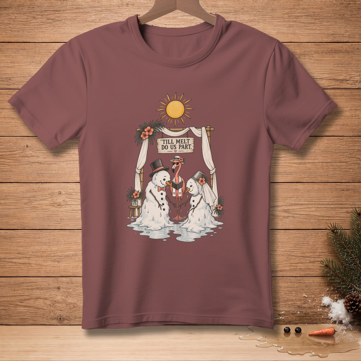 T-shirt graphic: melting snowmen wedding with flamingo officiant and "Till Melt Do Us Part" sign.