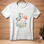 Melting snowman with a flamingo holds a tropical drink on a white t-shirt.