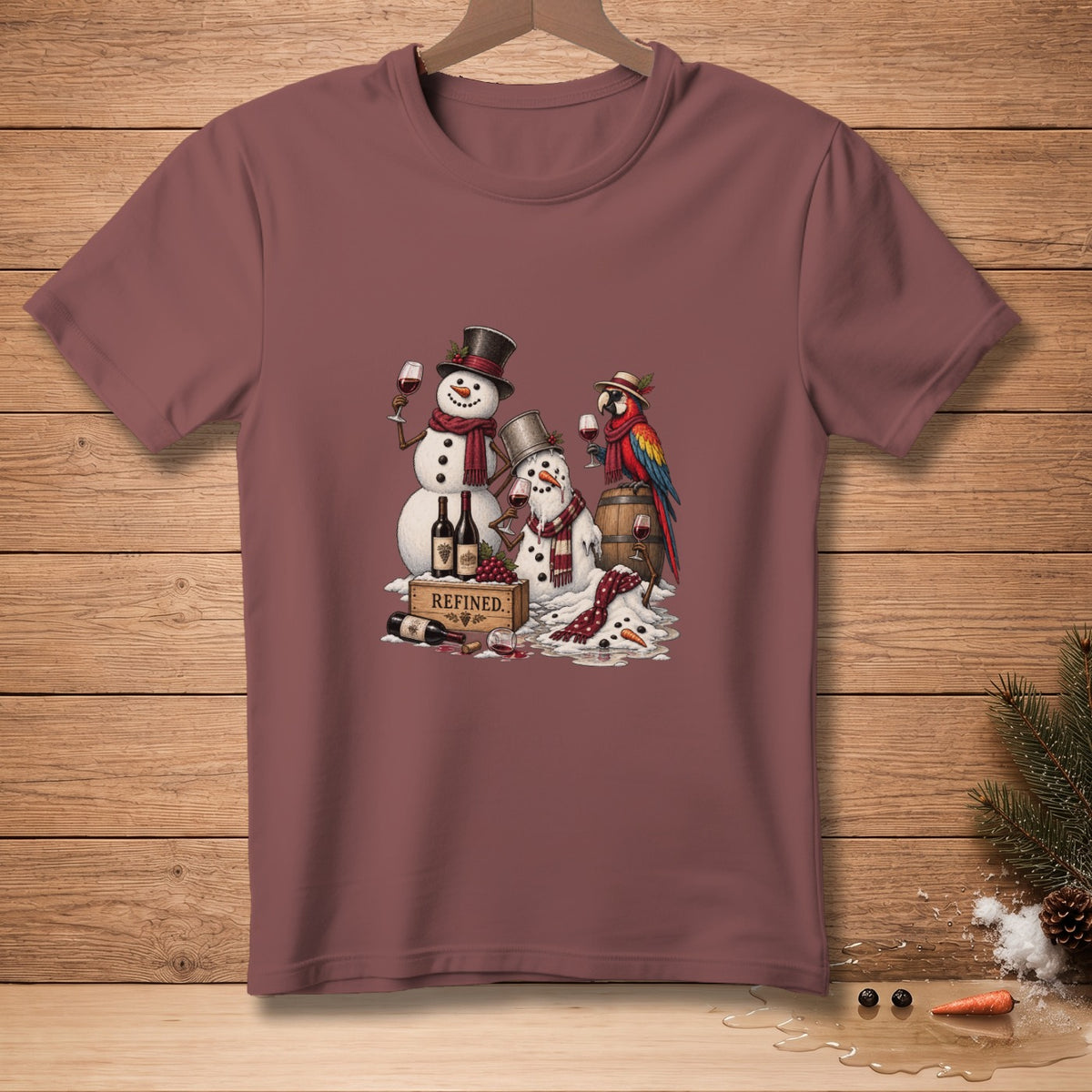 Two snowmen and a parrot enjoy wine and grapes next to a barrel and wine bottles.
