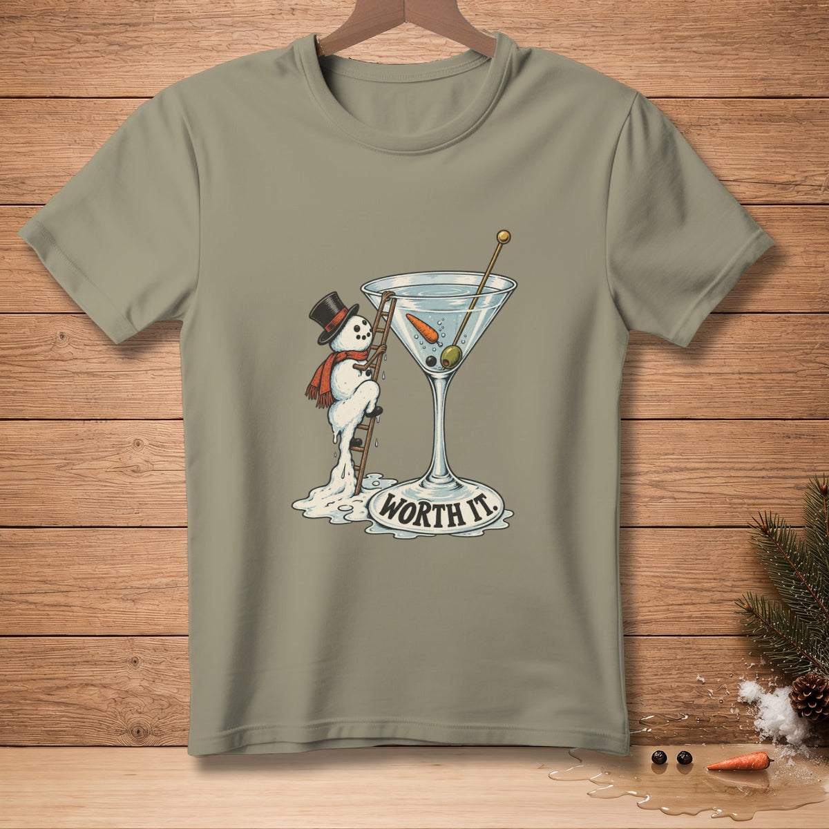 Snowman with top hat and scarf climbing ladder into martini glass, text "WORTH IT".