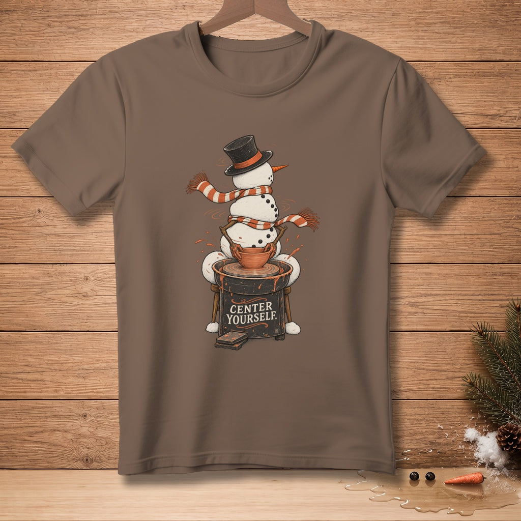 Brown t-shirt with snowman on pottery wheel, reads "CENTER YOURSELF."