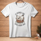 White t-shirt with snowmen in a hot tub and the text "It seemed like such a great idea."
