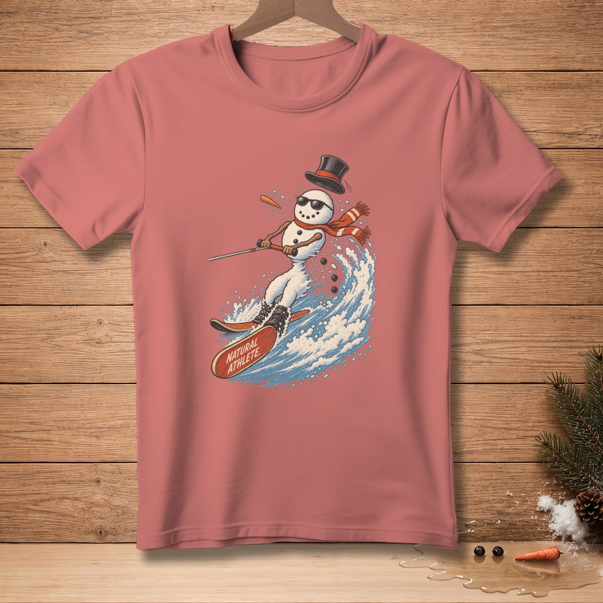 Snowman waterskiing on a wave with text "Natural Athlete" on the ski.