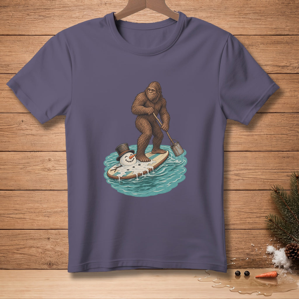 Bigfoot surfs with a melting snowman wearing a hat on a paddleboard.