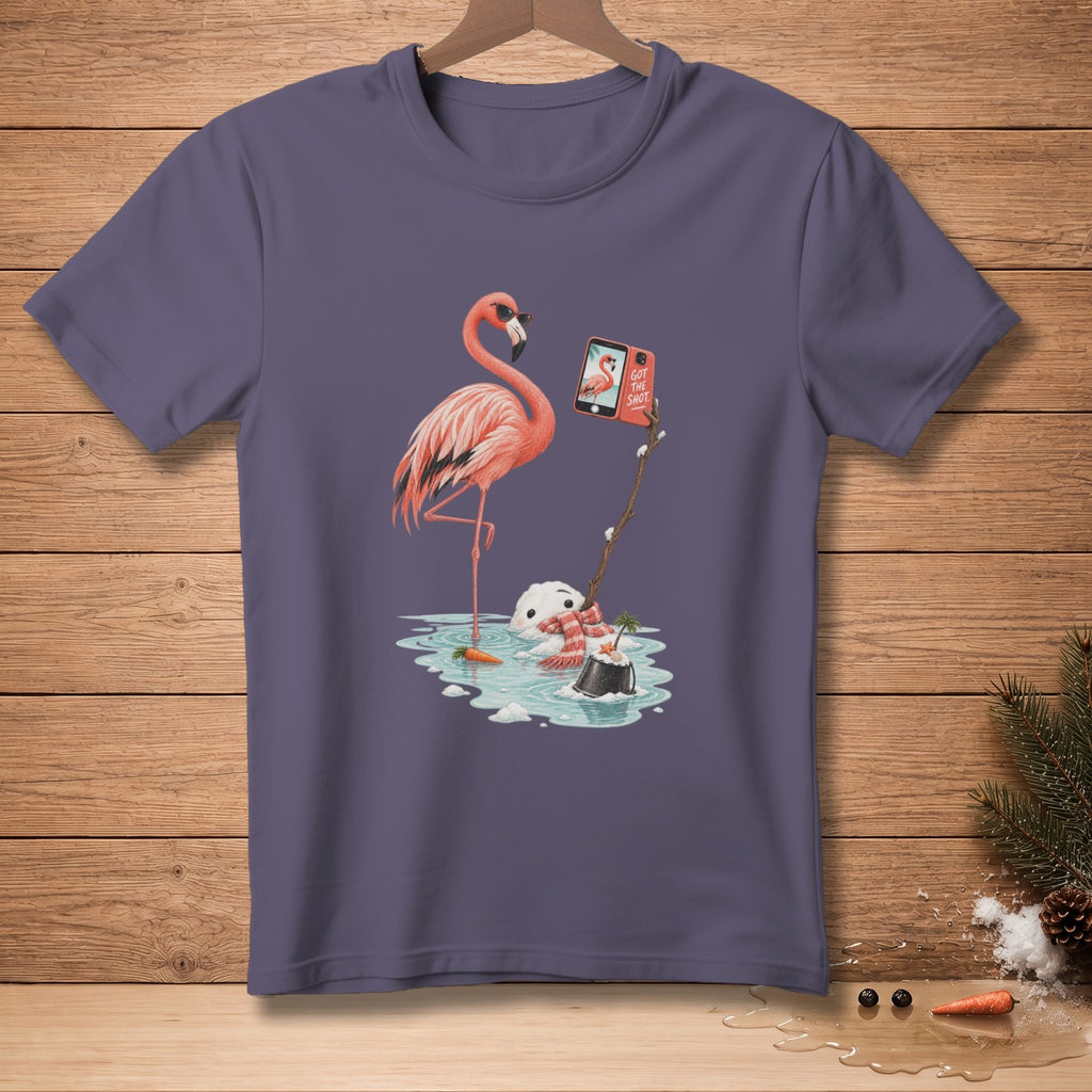 Flamingo wearing sunglasses takes selfie with melting snowman in puddle, text says "Got The Shot".