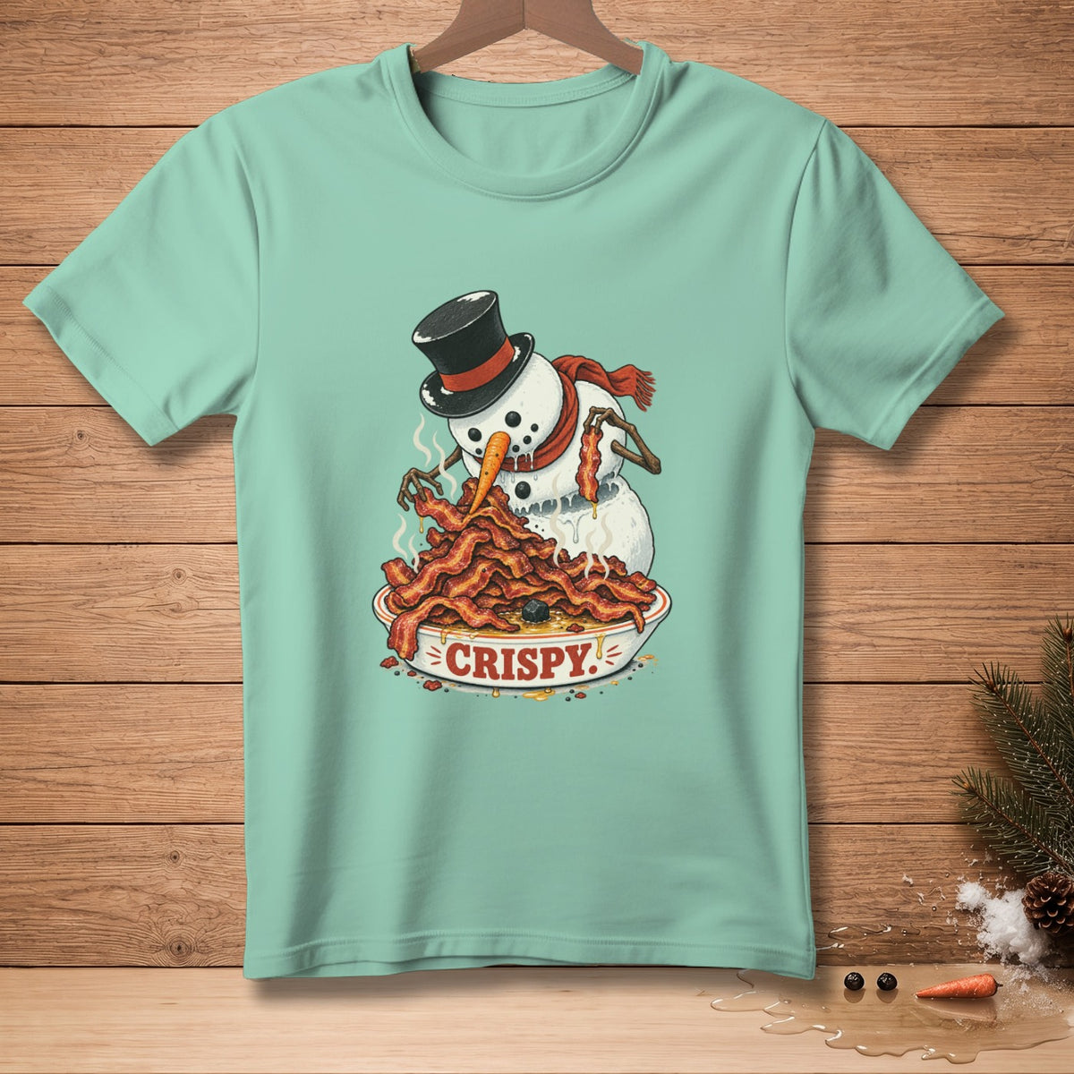 Snowman wearing a top hat and scarf eating a pile of bacon from a bowl labeled "CRISPY".