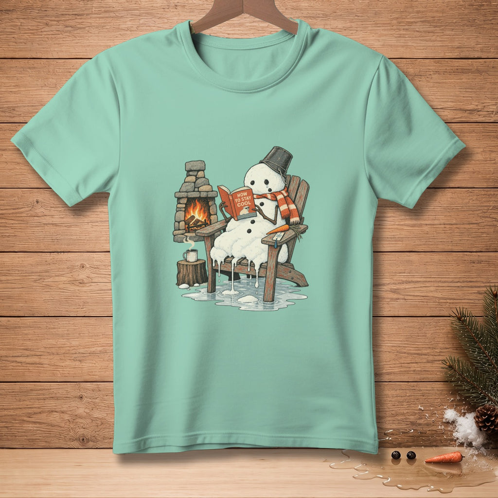 Melting snowman in Adirondack chair reads "How to Stay Cool" book by fireplace.