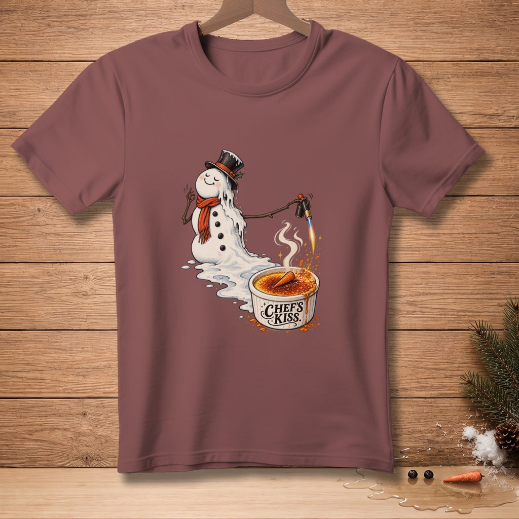 Snowman melting with torch, caramelizing creme brulee with carrot, text "Chef's Kiss".