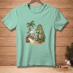 T-shirt with a cartoon T-Rex sharing a carrot with a melting snowman on a beach.