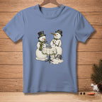Two snowmen with top hats and scarves drink martinis near a melting snowman.