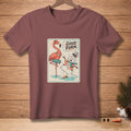 T-shirt with a flamingo and melting snowman graphic that says "GOOD FORM."