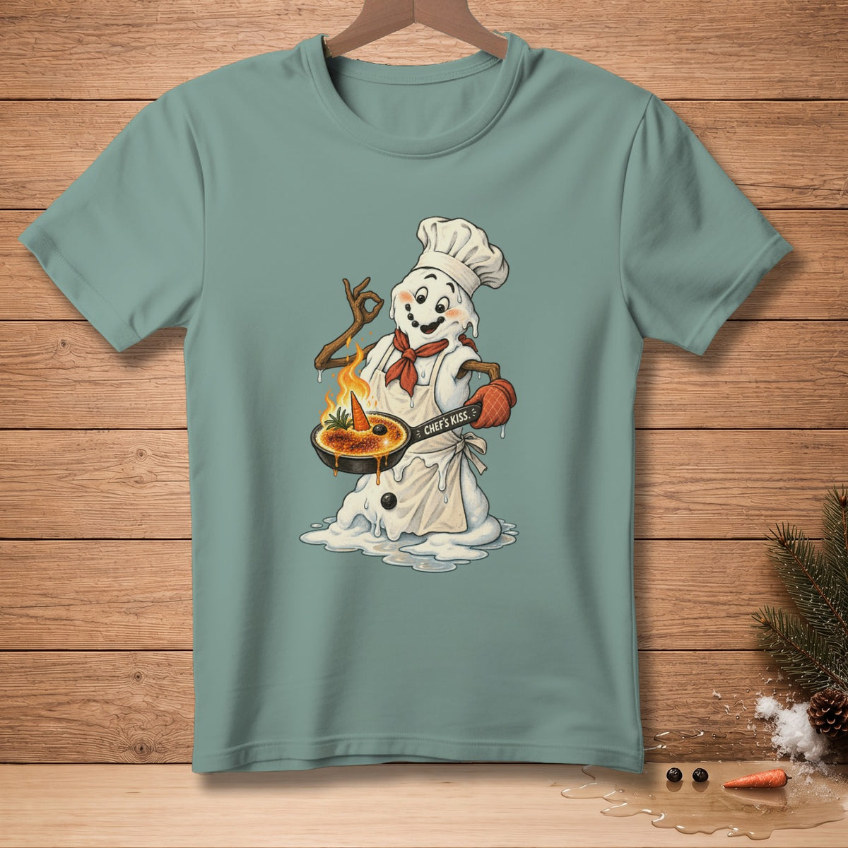 Chef snowman melting, holding a pan of crème brûlée with text "Chef's Kiss."