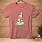Melting snowman meditating on a mat that says "LET IT GO."