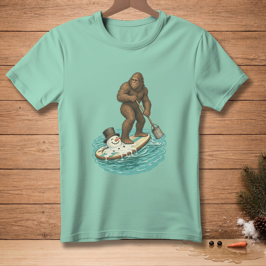 Bigfoot paddles a surfboard with a melting snowman, wearing a top hat.