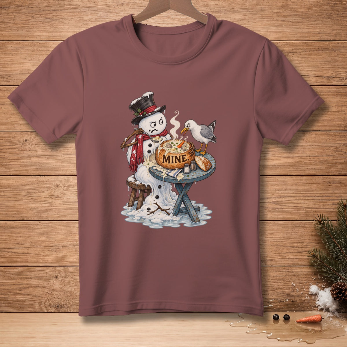 Snowman with hat and scarf eating soup, seagull approaching bowl labeled "MINE".