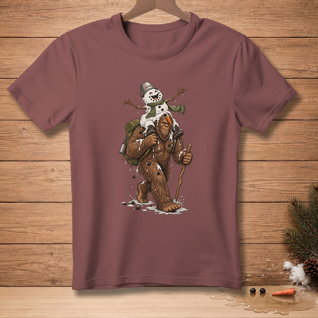 Bigfoot carrying a melting snowman on his shoulders, with a backpack and walking stick.