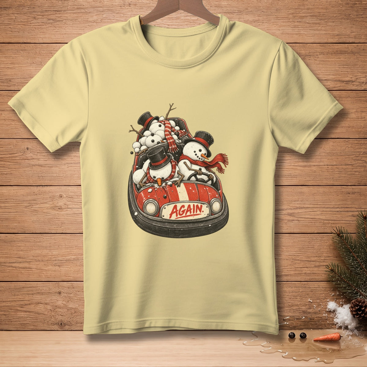 Yellow t-shirt with snowmen packed in a bumper car with the word "AGAIN".