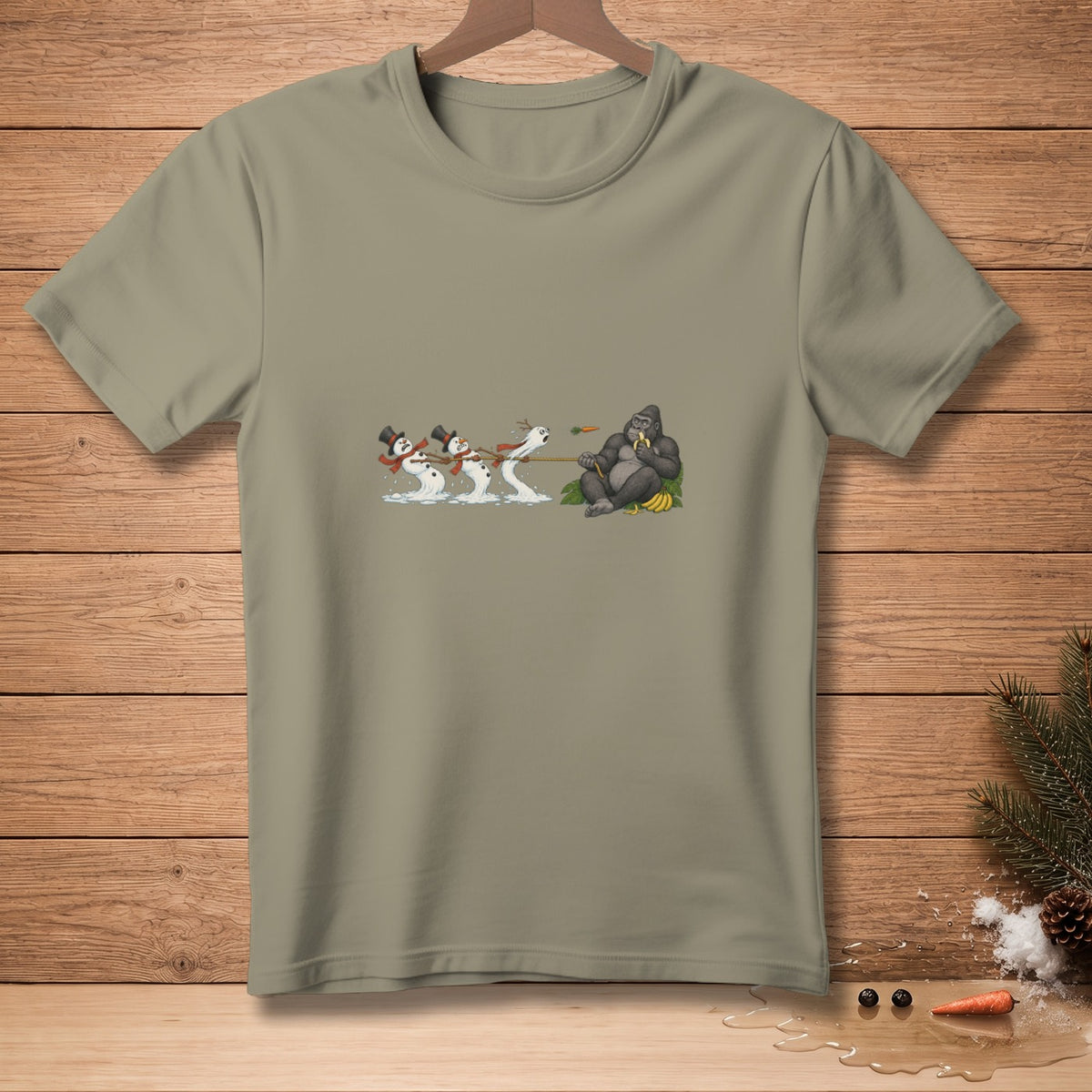Snowmen tugging rope towards a gorilla eating bananas.