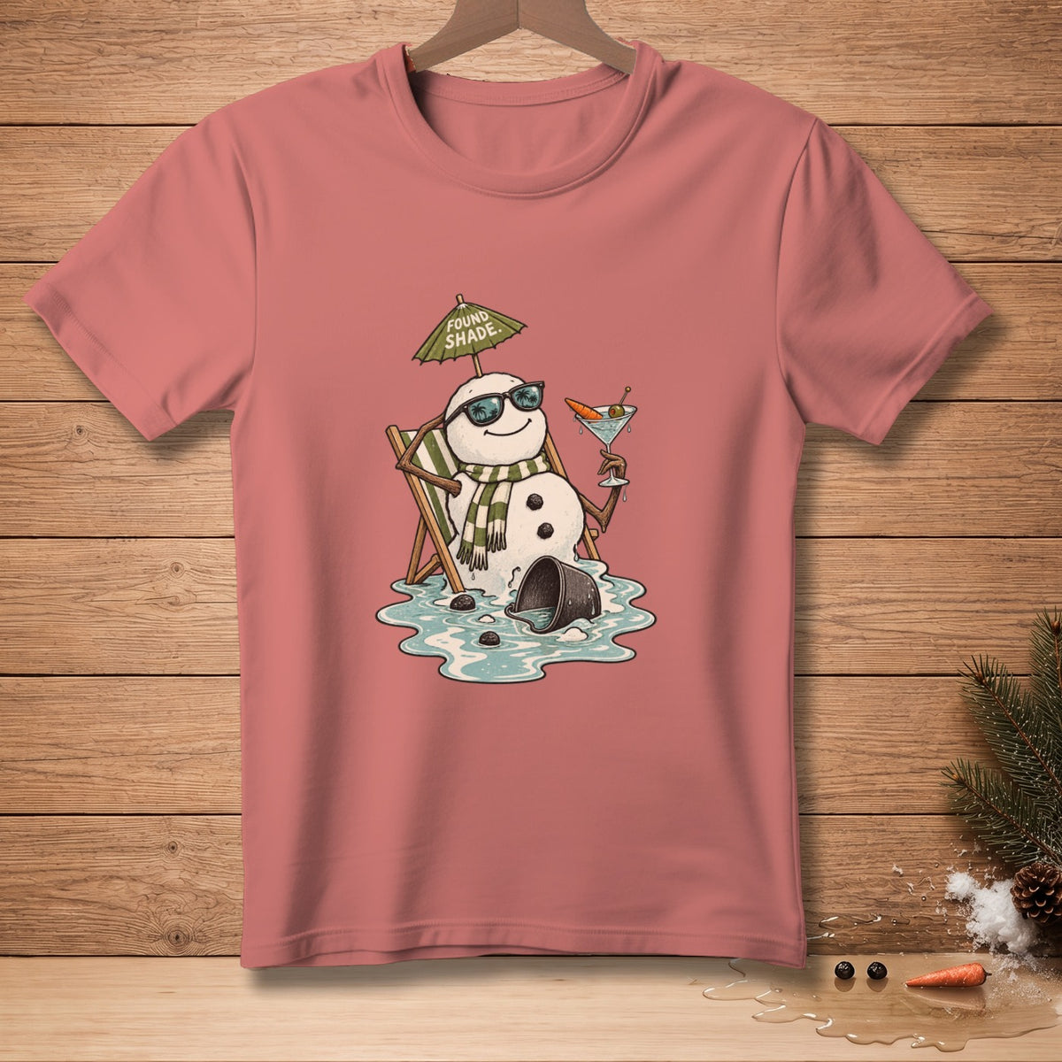 Snowman in sunglasses with martini and umbrella on a beach chair, text "Found Shade".