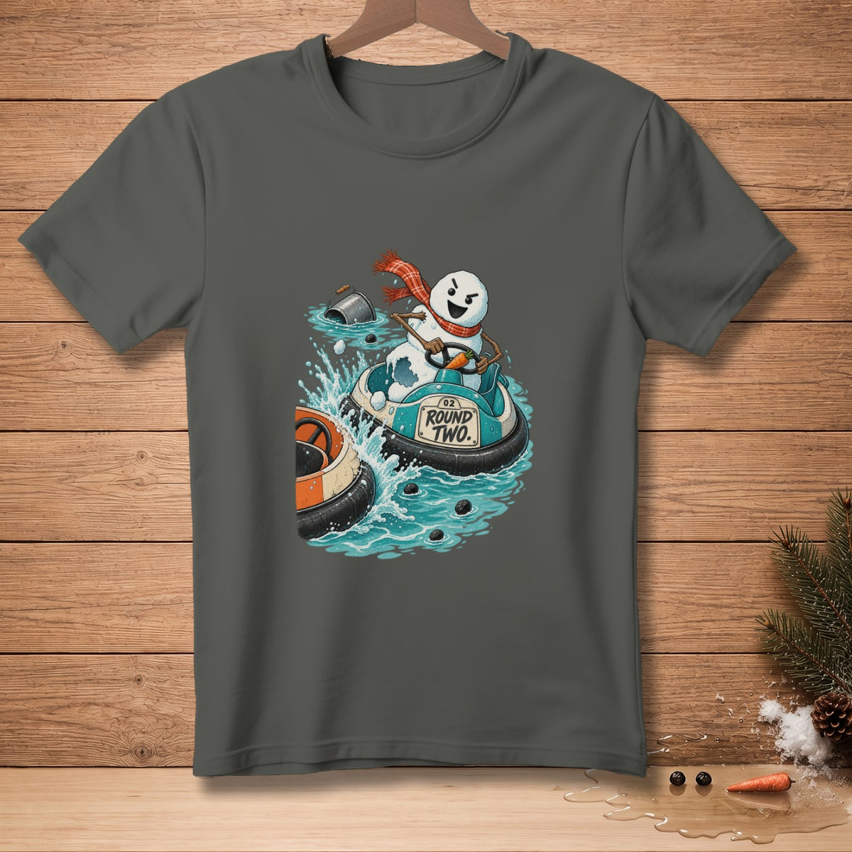 Snowman in bumper car with "ROUND TWO." text, on a gray t-shirt.
