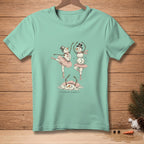 Snowmen in ballet attire dance on a mint green t-shirt, with "Swan Lake" text.