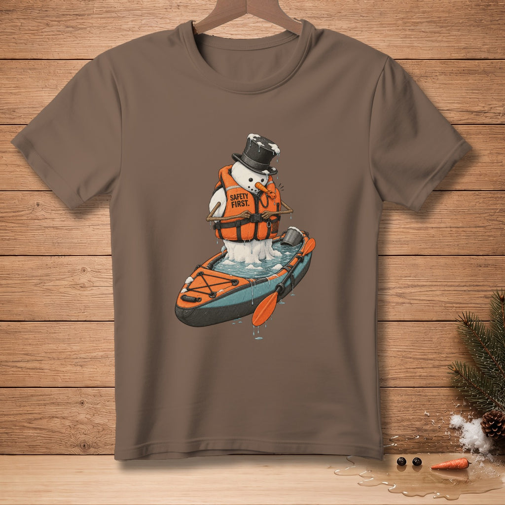 Snowman in a kayak wearing a life jacket with "Safety First." text.